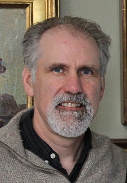 A portrait of artist John Traynor